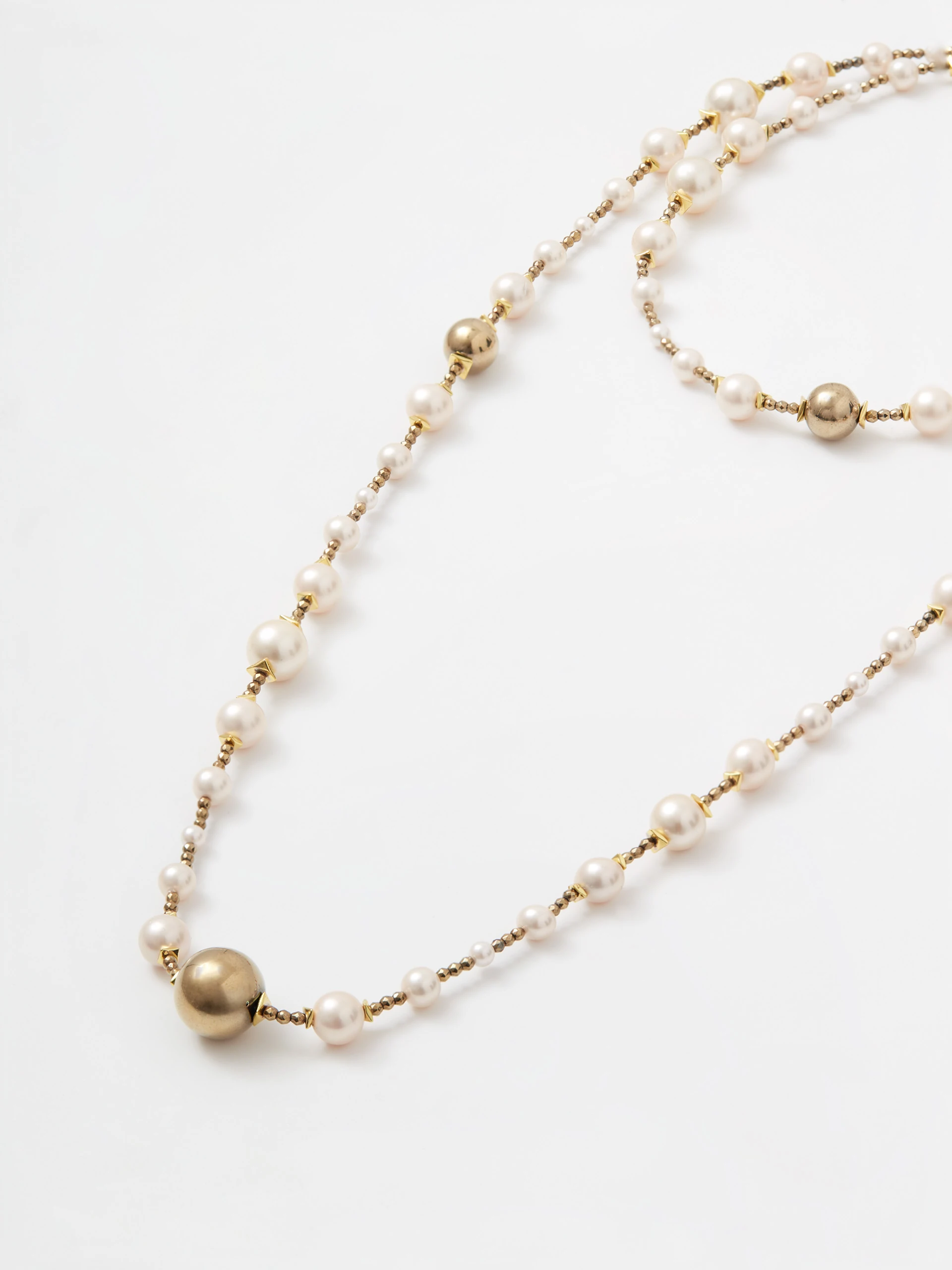 Long necklace made of natural pearls and hematite