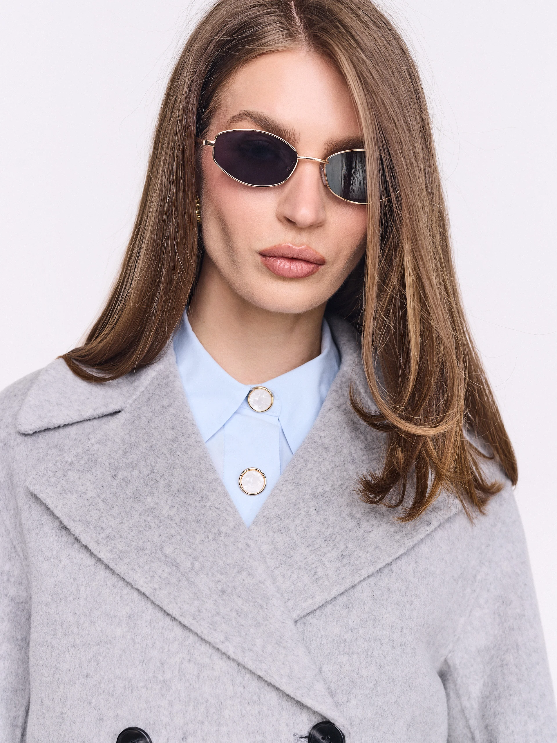 Narrow sunglasses with gold frames