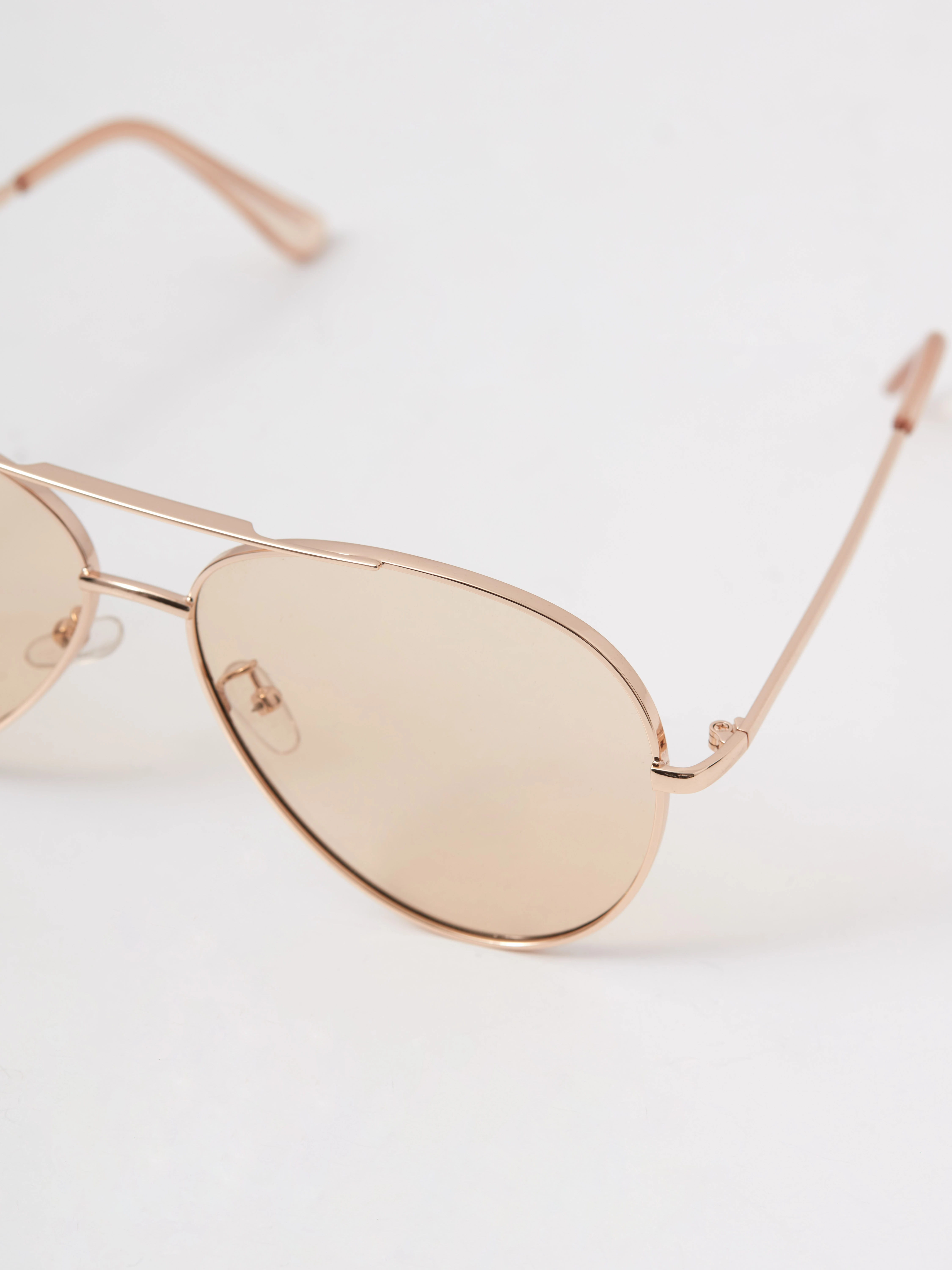 Gold-colored sunglasses