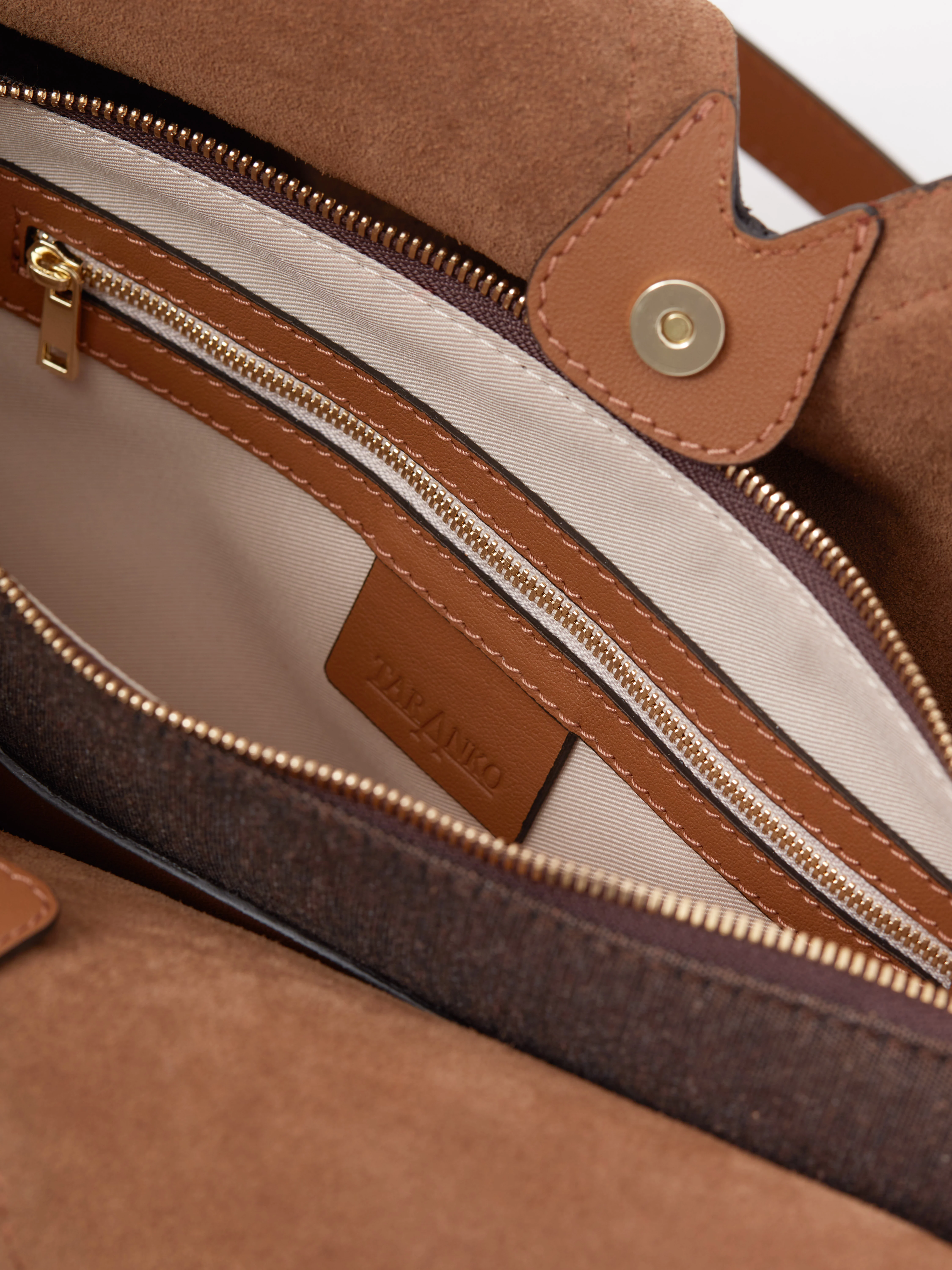 Large suede bag with braided trim