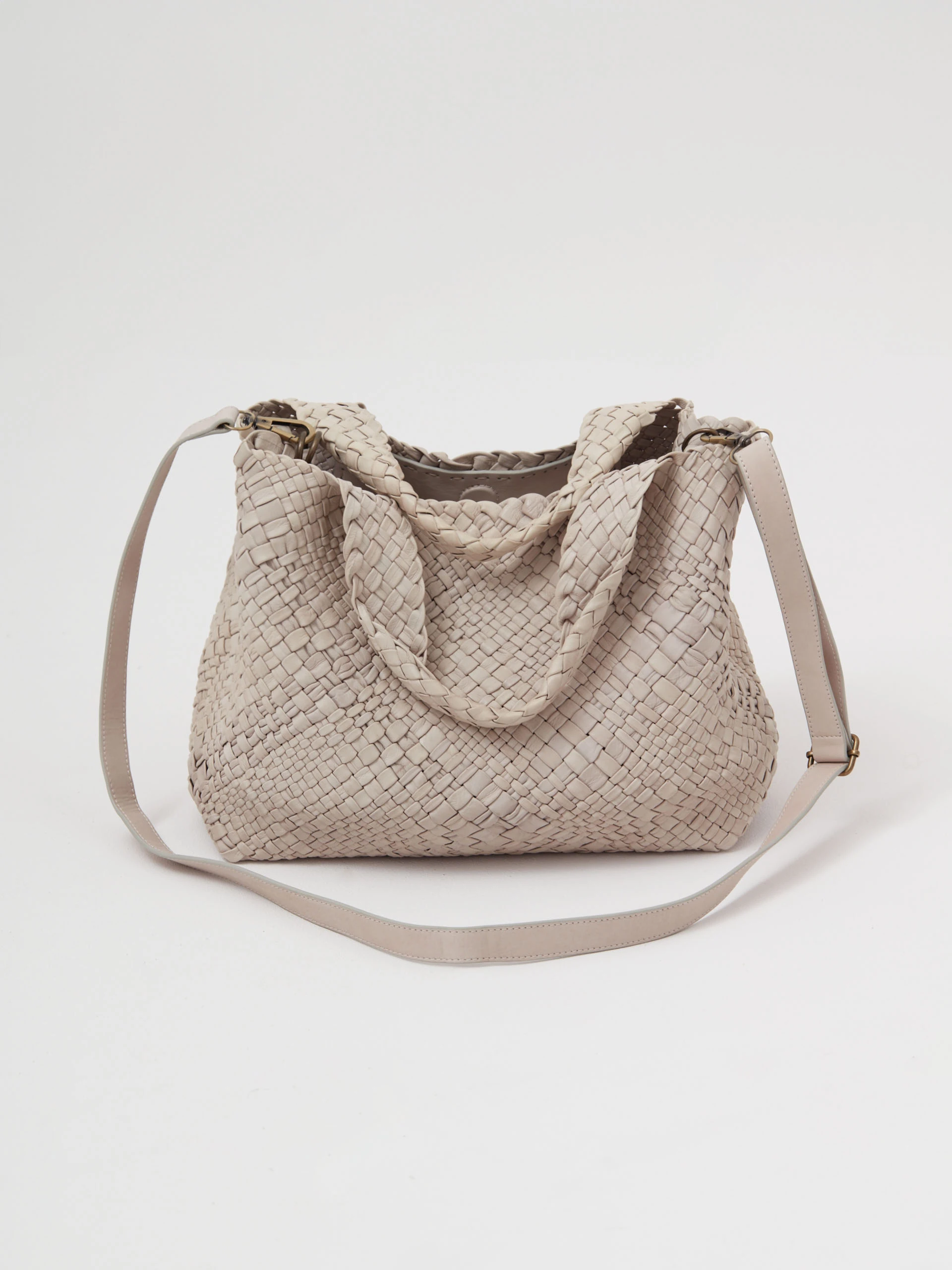 Creamy bag made of woven natural leather