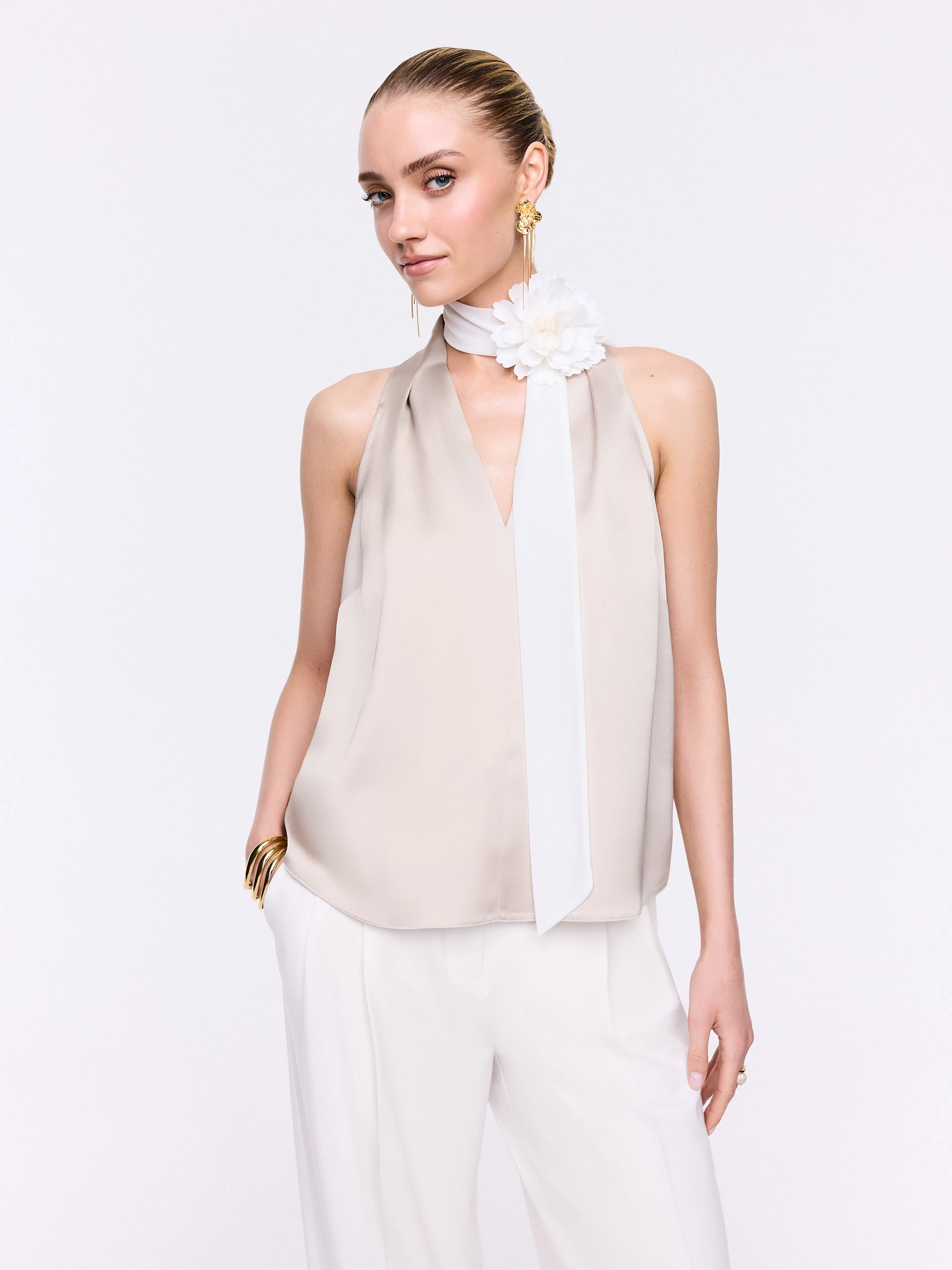 A satin blouse in a powder pink shade