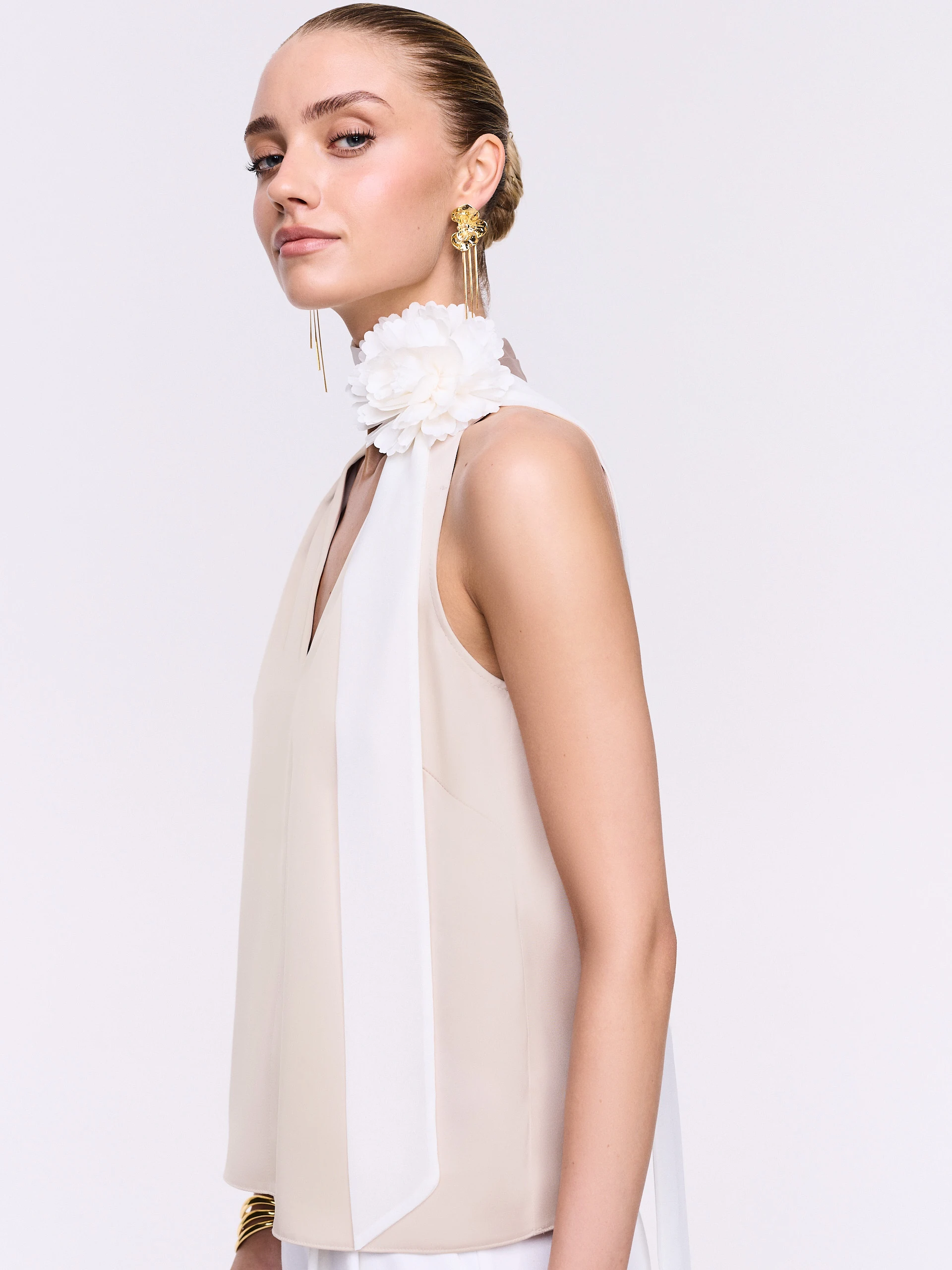 A satin blouse in a powder pink shade