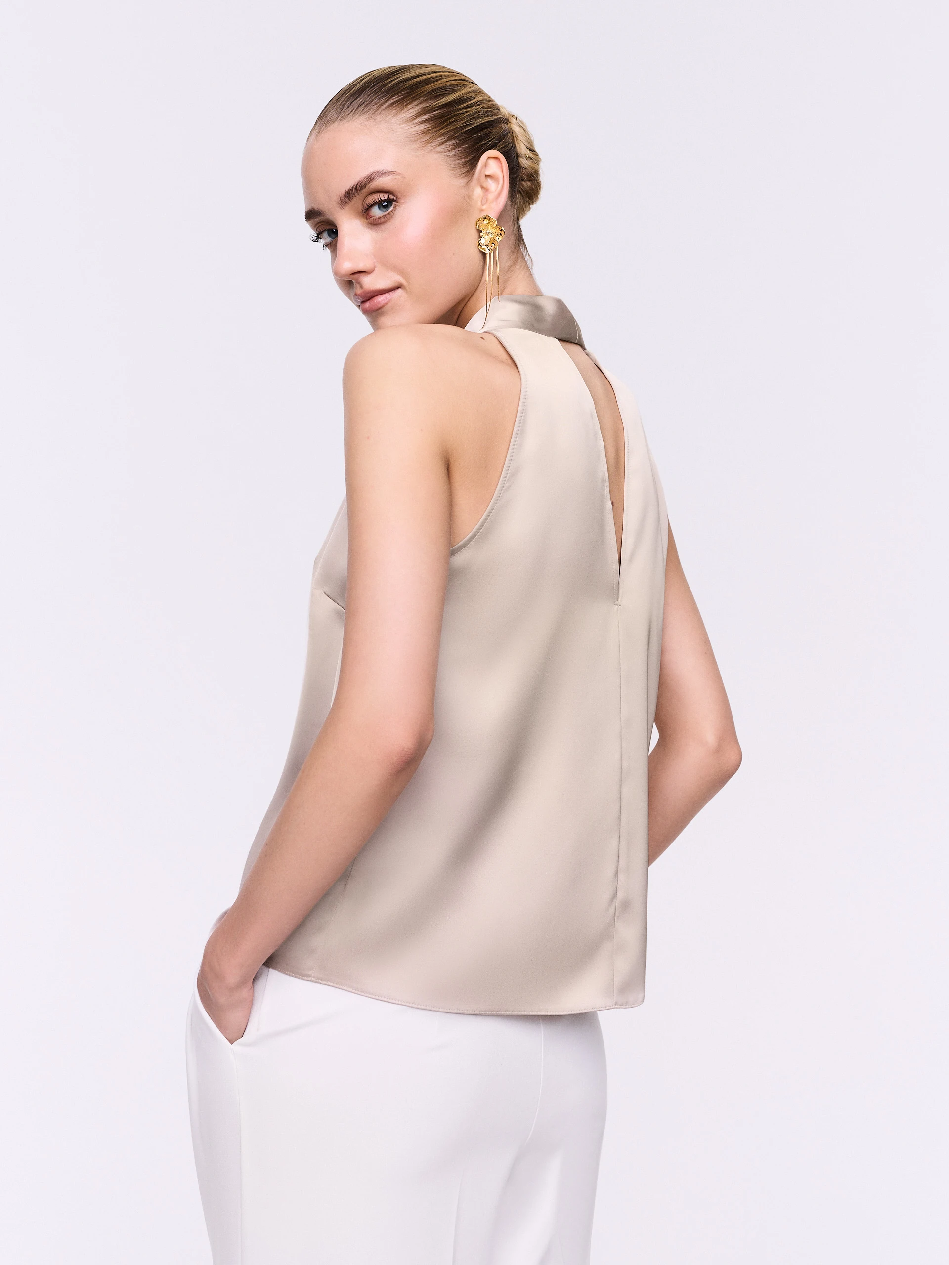 A satin blouse in a powder pink shade