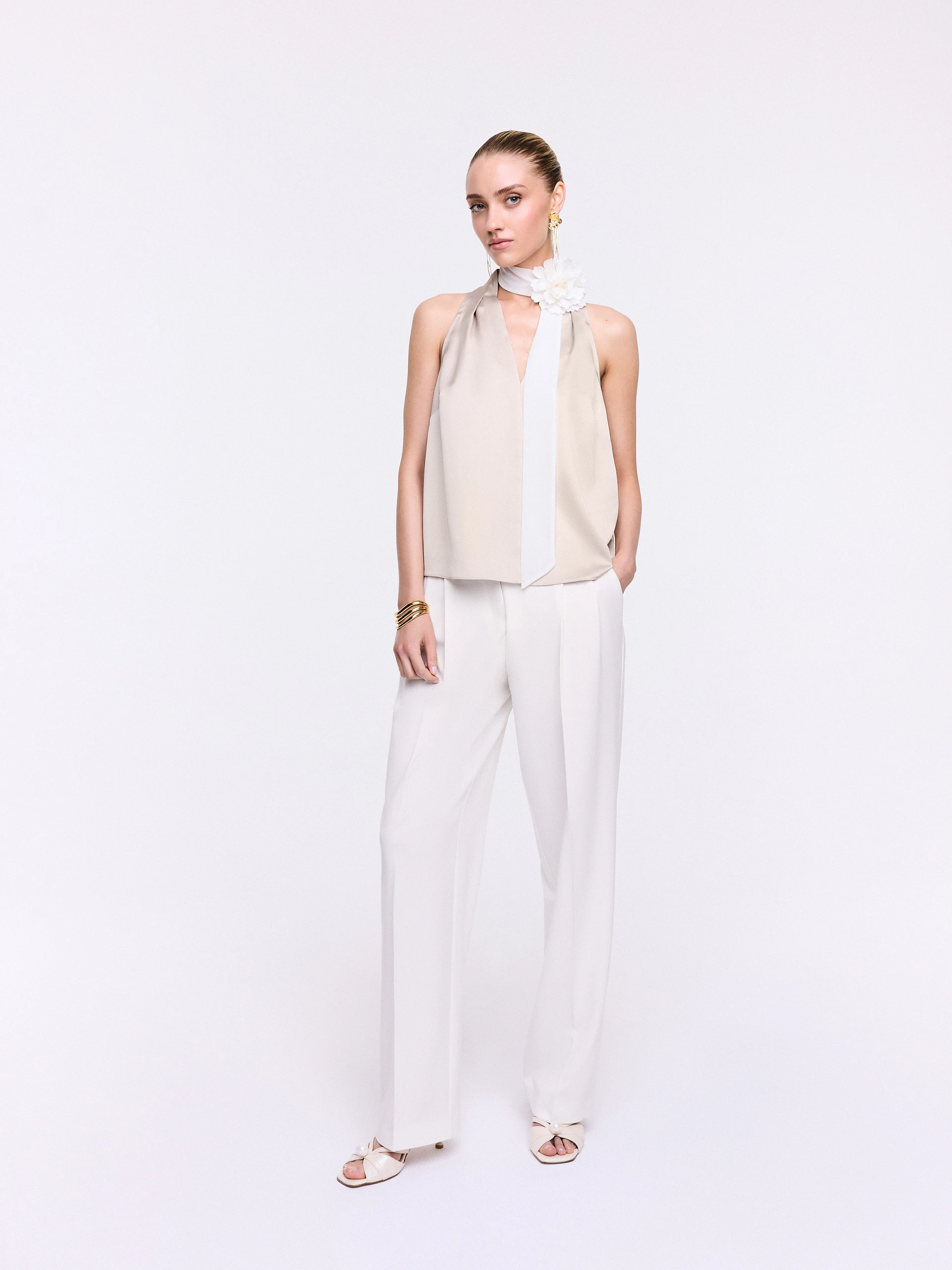 A satin blouse in a powder pink shade