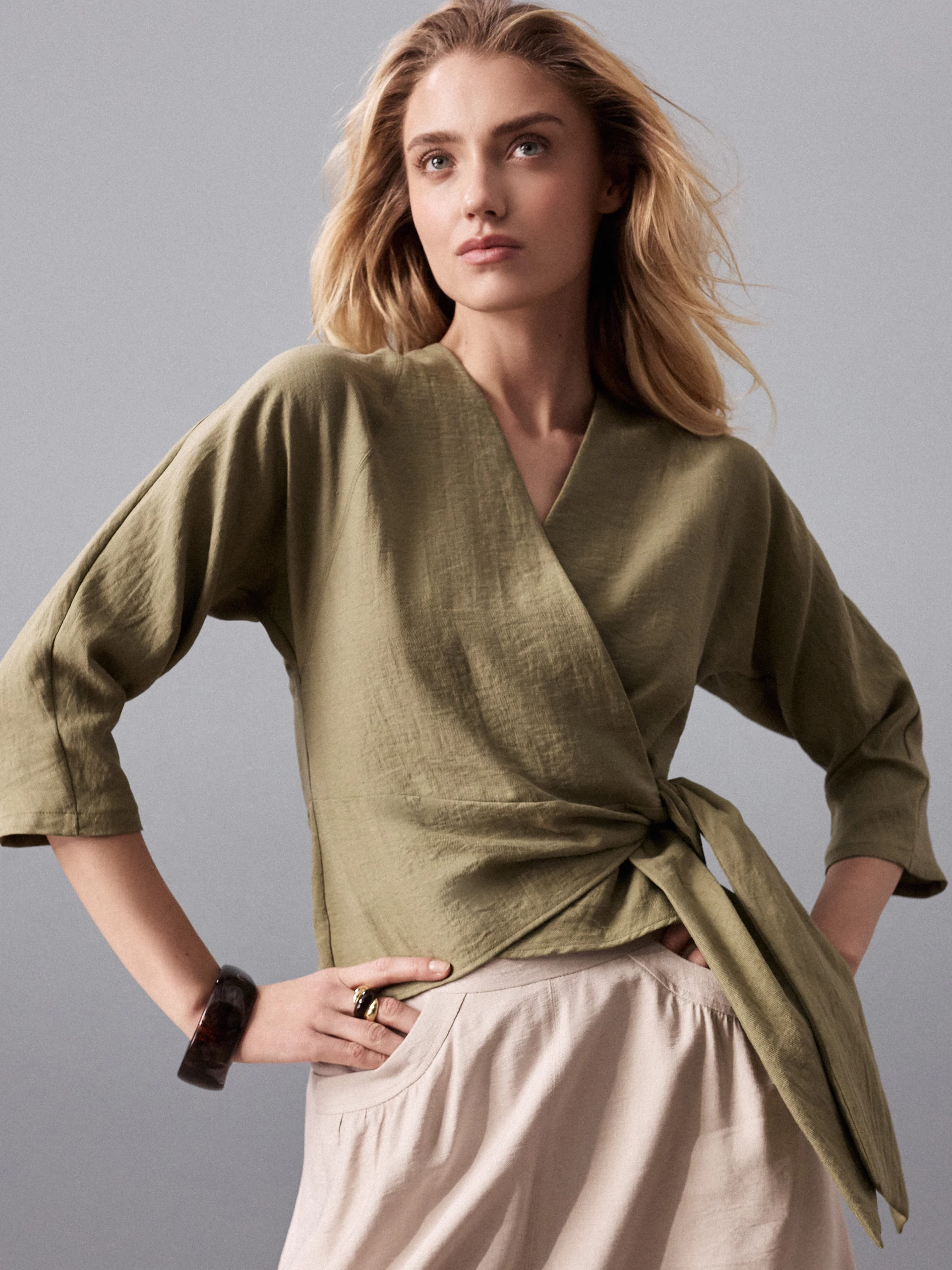 Olive-green viscose blouse with a wrap-around neckline