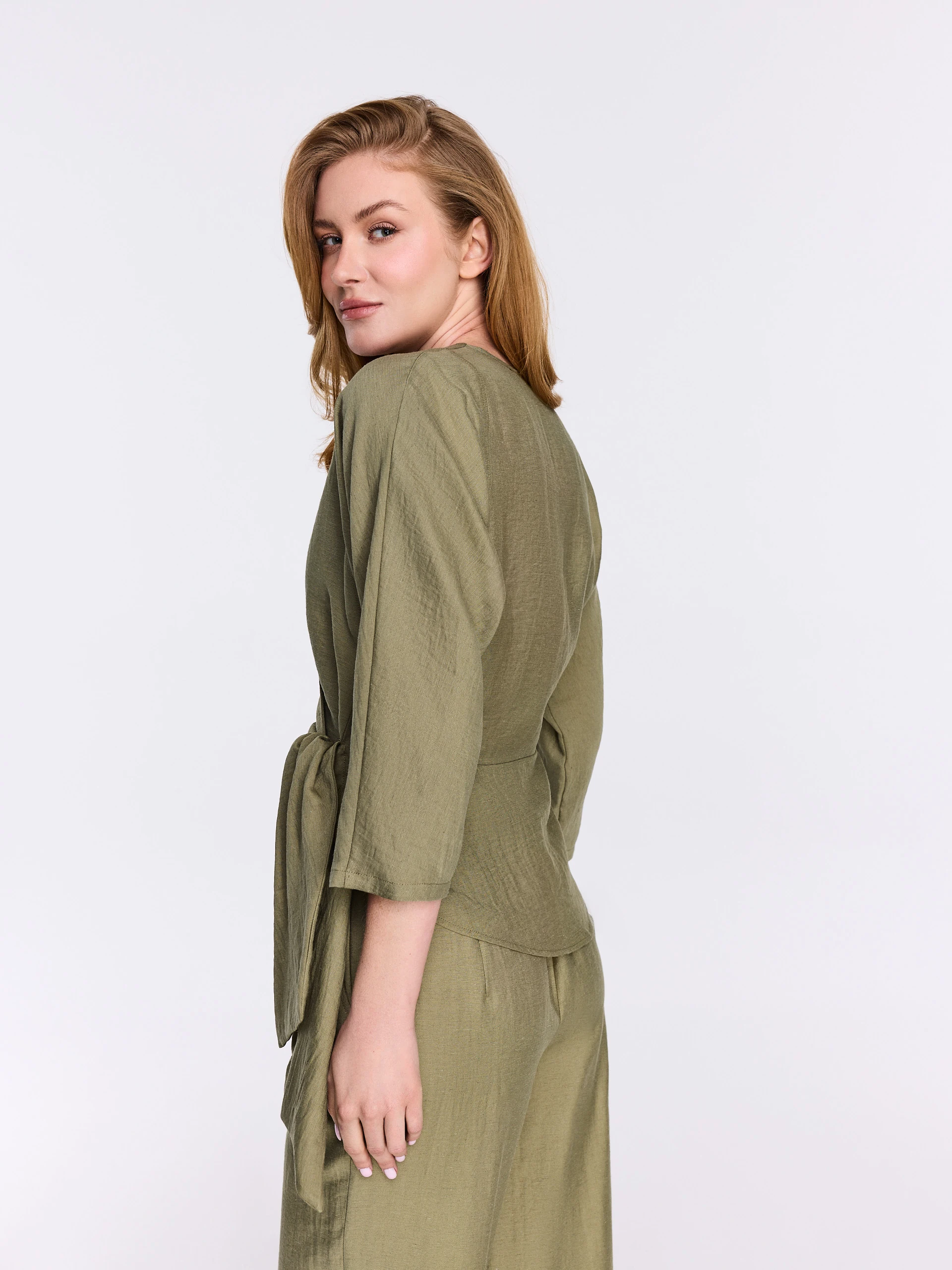 Olive-green viscose blouse with a wrap-around neckline