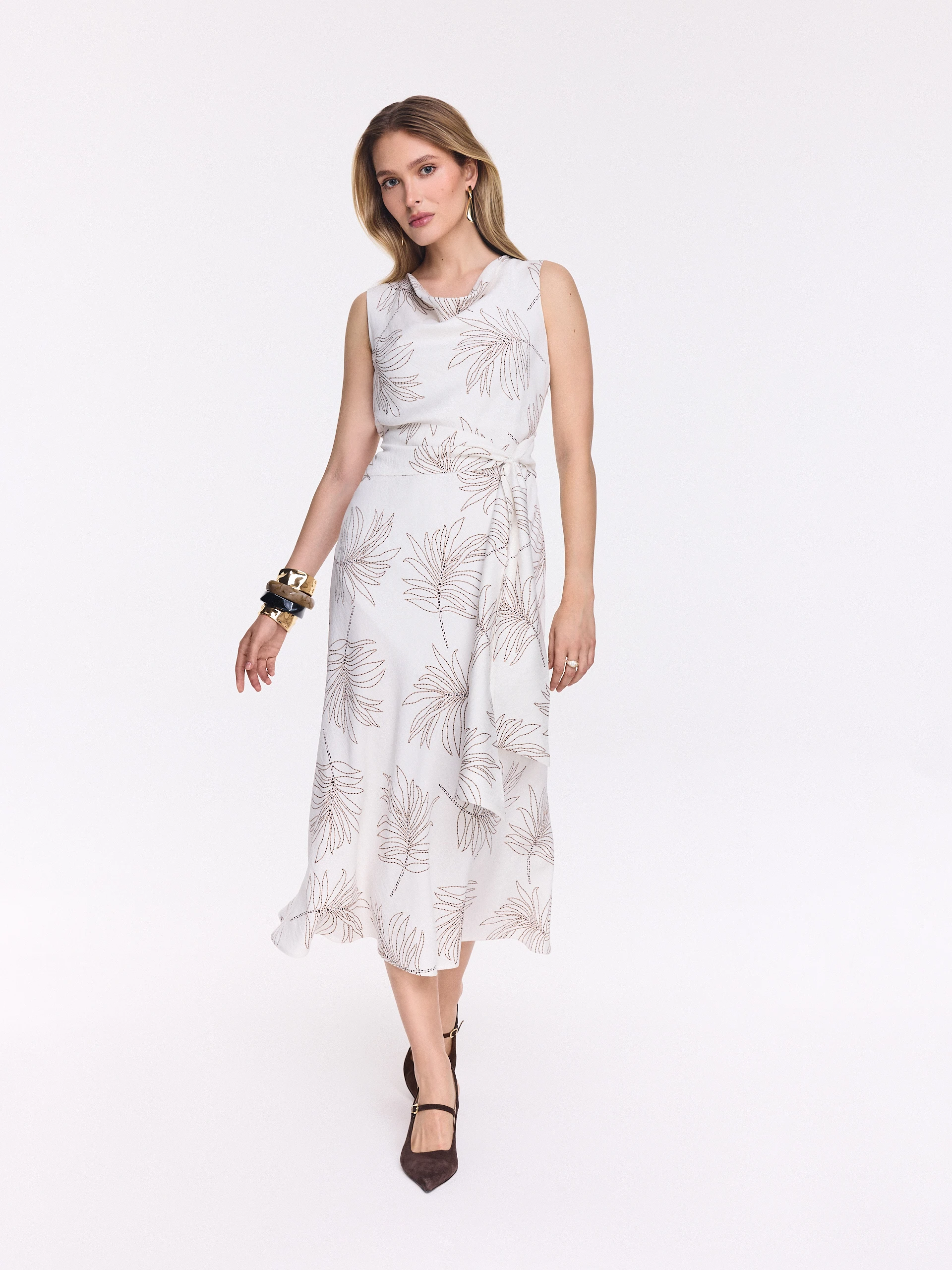 White midi dress with a leaf pattern