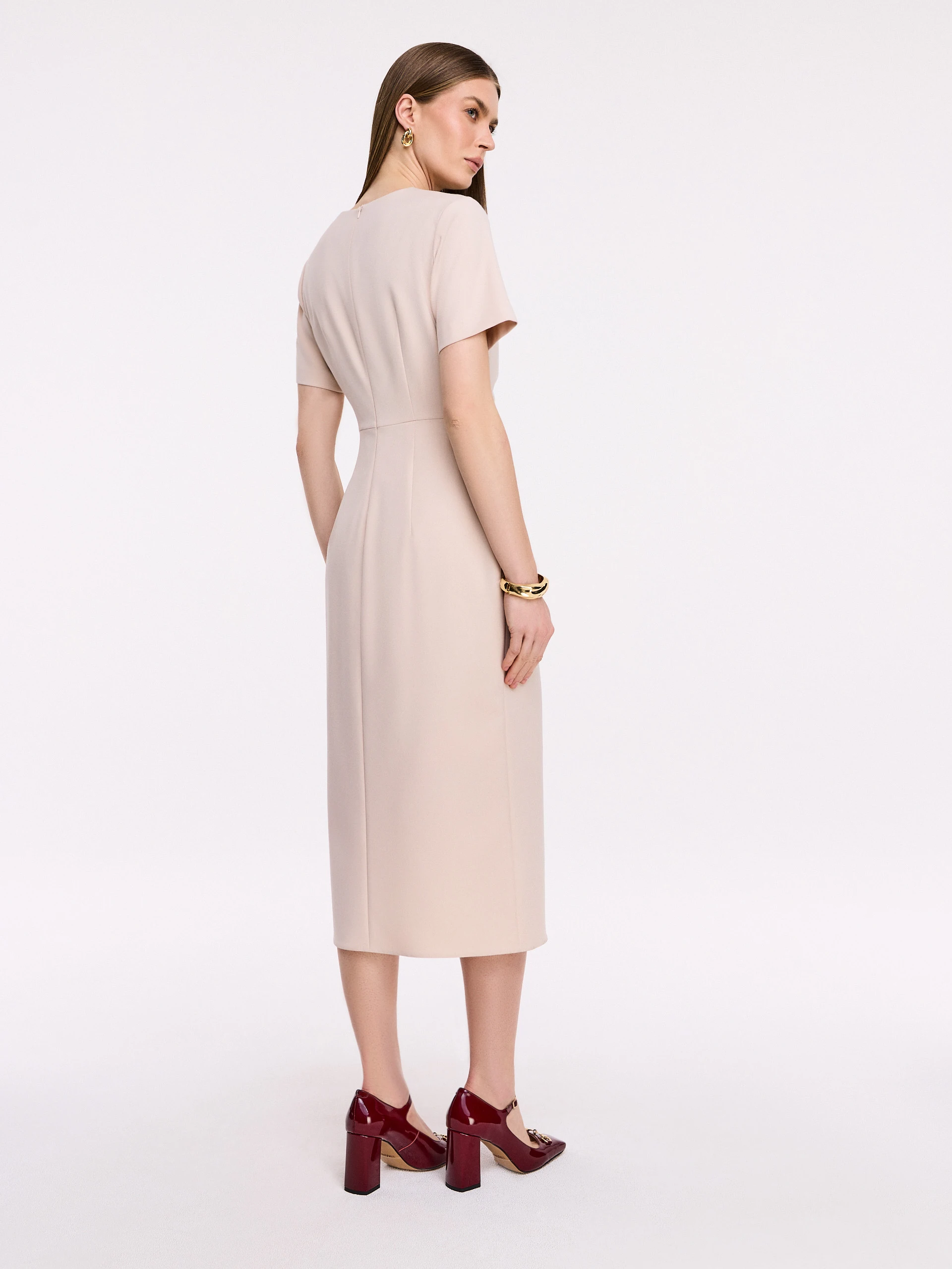 Cream midi dress with ruffles at the waist