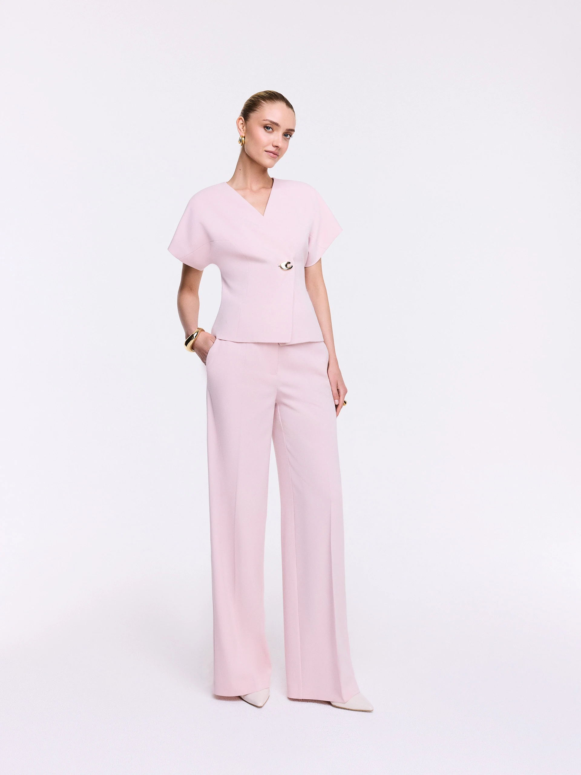 An elegant jacket with a decorative fastening