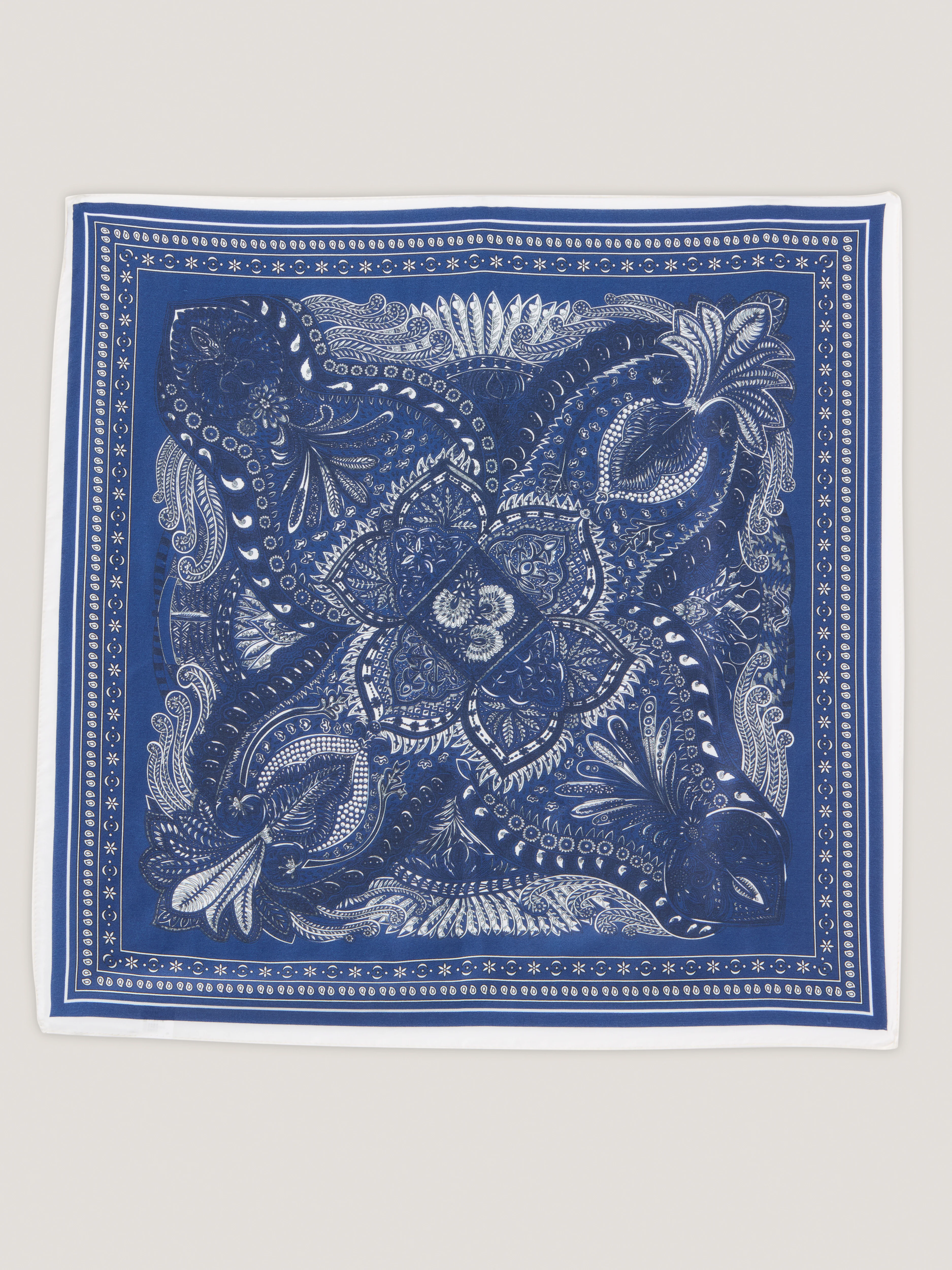 A silk scarf with a paisley pattern
