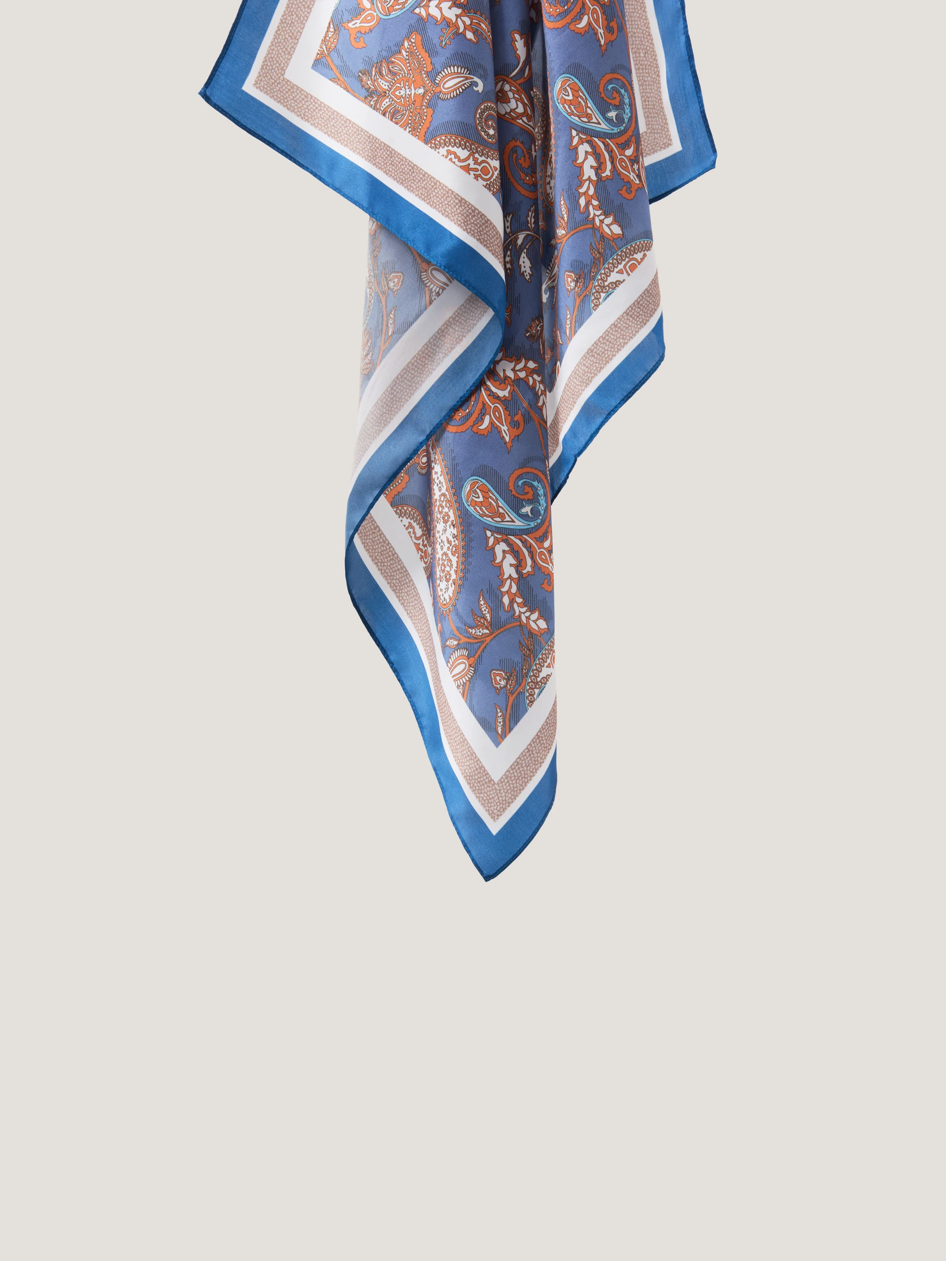 A silk scarf with a paisley pattern