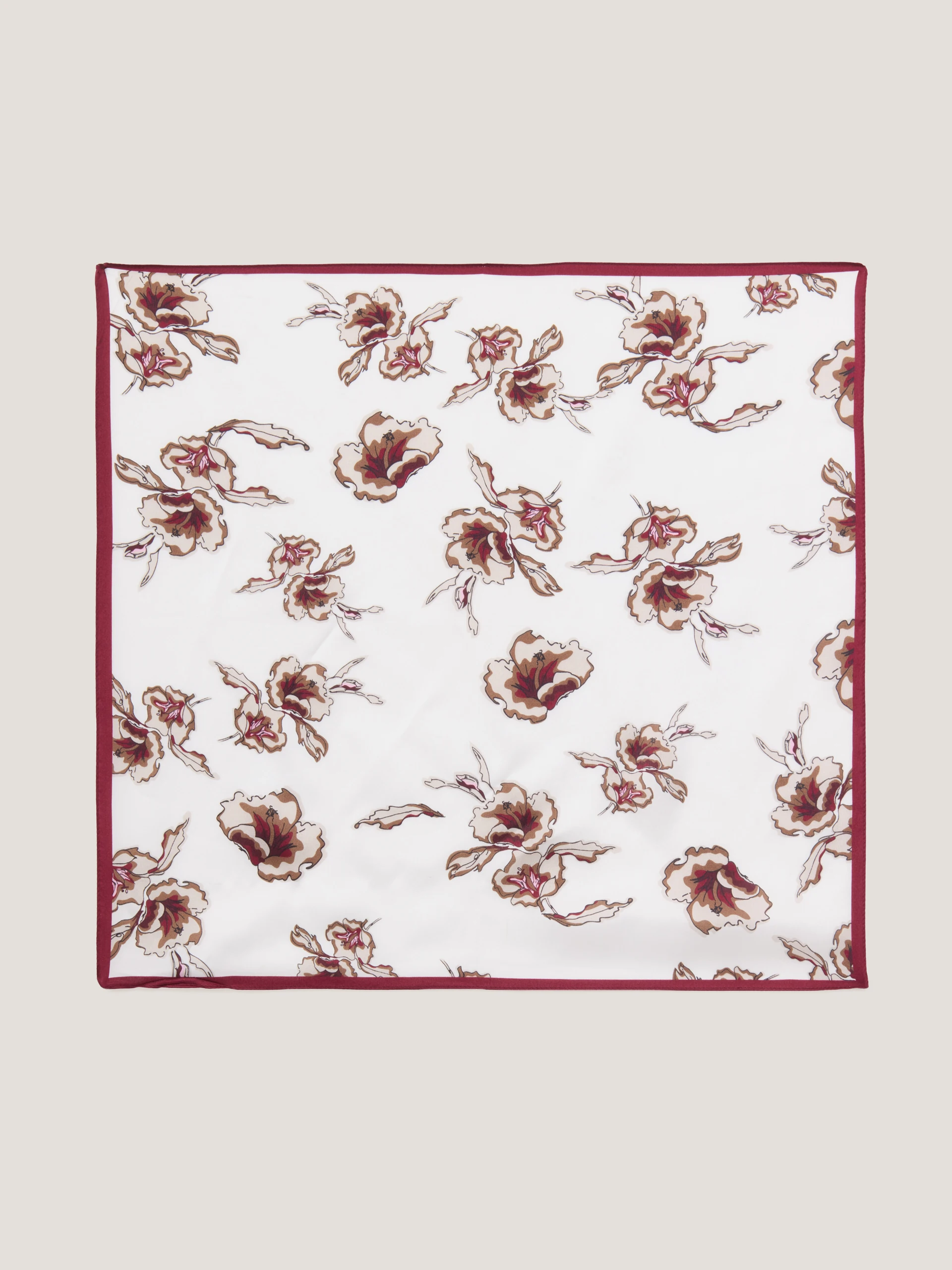An elegant silk scarf with a floral pattern