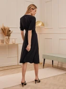BLACK DRESS WITH TASSELS AT THE BELT