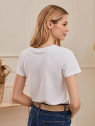 WHITE BLOUSE WITH DECORATIONS