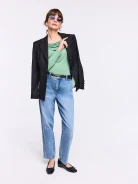 Light green blouse with ruffles and long sleeves