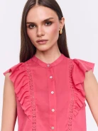 Coral button-down blouse with openwork embellishments and a stand-up collar