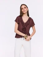Chocolate-colored short-sleeved blouse with frills