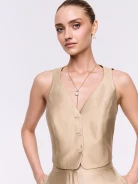 A vest in a golden shade
