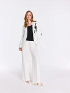 White straight-leg pants with a touch of linen