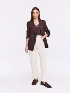 Cream-colored jeans with decorative embroidery