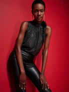 Black blouse in shiny material
