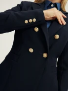 Navy blue jacket with gold buttons
