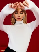 Fitted white turtleneck sweater