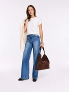 White cotton blouse with decorative frill