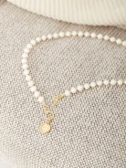 PEARL BRACELET WITH HEART-SHAPED CHARM