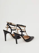 Black leather pumps