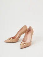 Beige leather pumps