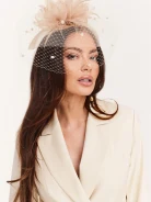 Fascinator in cream color with feathers