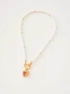Necklace with pearls and heart-shaped pendant