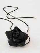 Black rose necklace on a thong