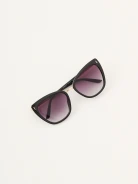 Black sunglasses in the shape of cat's eyes