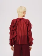 Elegancka burgundowa bluzka z falbanami