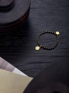 BRACELET WITH A COIN
