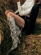 High boots in animal print