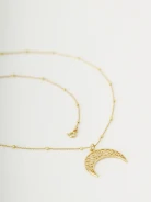 Necklace with openwork crescent moon