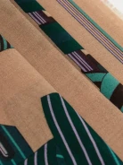 Beige light scarf in green pattern