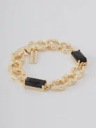 Gold color bracelet with glass stone