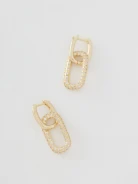 Feminine earrings with a geometric form
