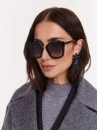 Black sunglasses with decorative inserts
