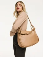 Soft beige handbag with decorative strap