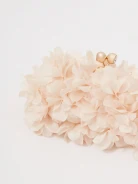 Textured handbag in the form of flower petals