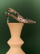 Leather pumps with animal print