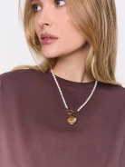 A necklace made of natural pearls with a gold-plated pendant