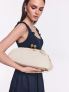 Cream-colored leather handbag with woven detailing