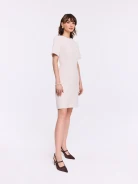 Beige dress with pearls at the collar